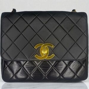 CHANEL Black Quilted Flap 24K Gold CC Logo Leather Shoulder Bag